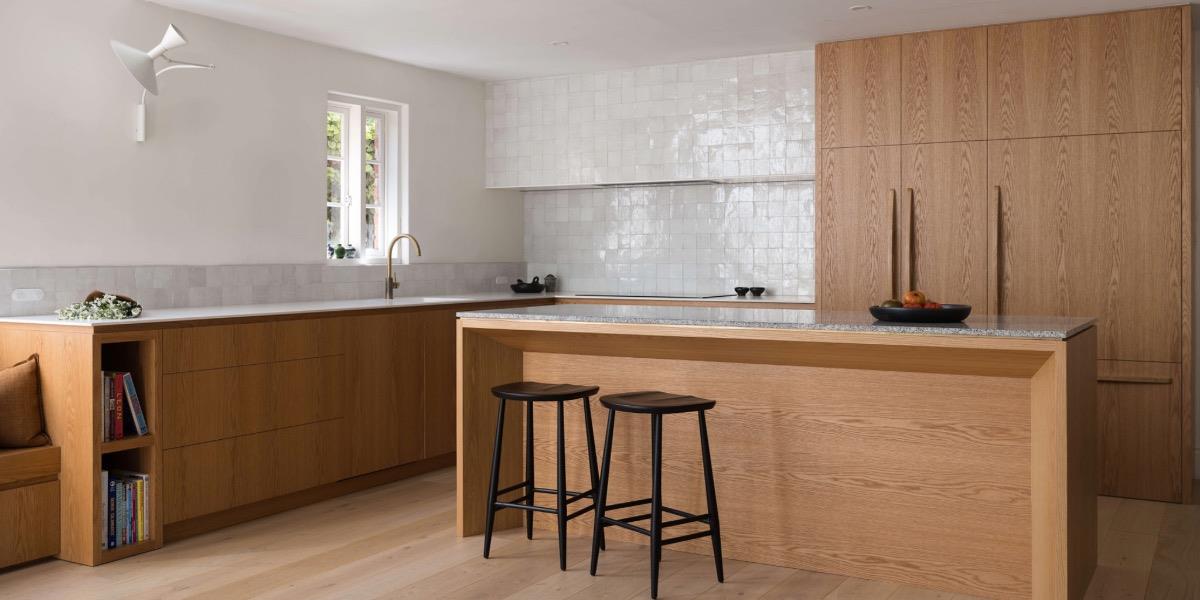 Adelaide's Sophie Doumbiotis (Sophie Katina) used Japanese-inspired, glazed porcelain tiles to evoke handcrafted character in this striking kitchen. The Italian-made wall tiles offer stunning light reflection and unique pattern-making qualities, making them the perfect design solution for this truly beautiful space.